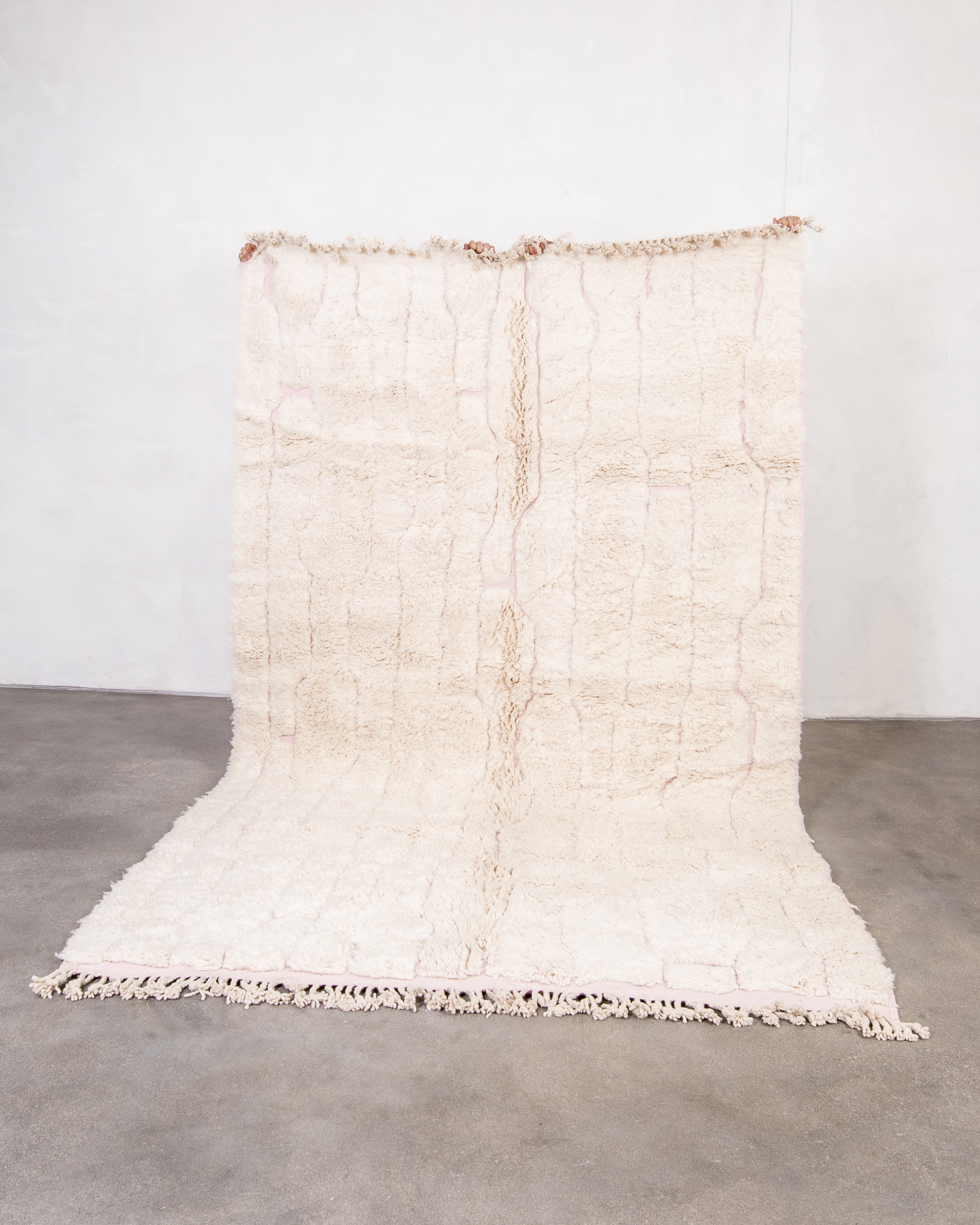 Modern, designer, handcrafted Berber rug from Morocco. Beniourain carpet with beautiful colors and patterns and fluffy wool texture.
